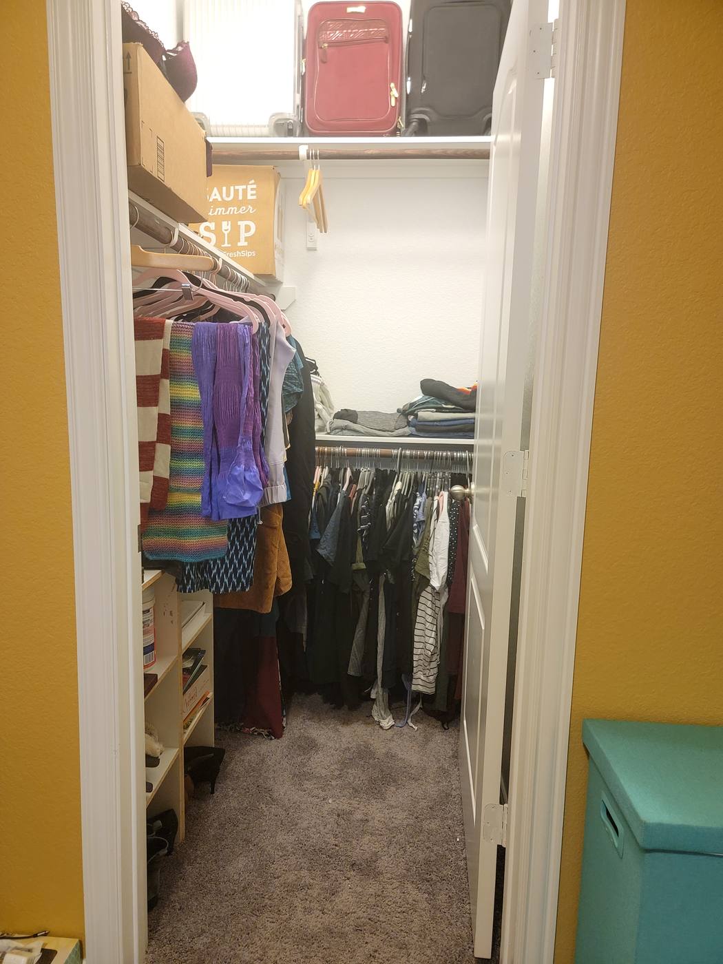 A walk-in closet with clothes and bags heaped on the floor, then the same closet with hanging rods sorted and the floor clear